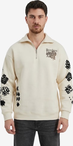 Sweat-shirt 'Oversize Half-Zip Graphic Sweatshirt - Beige' Kleidermafia en beige : devant