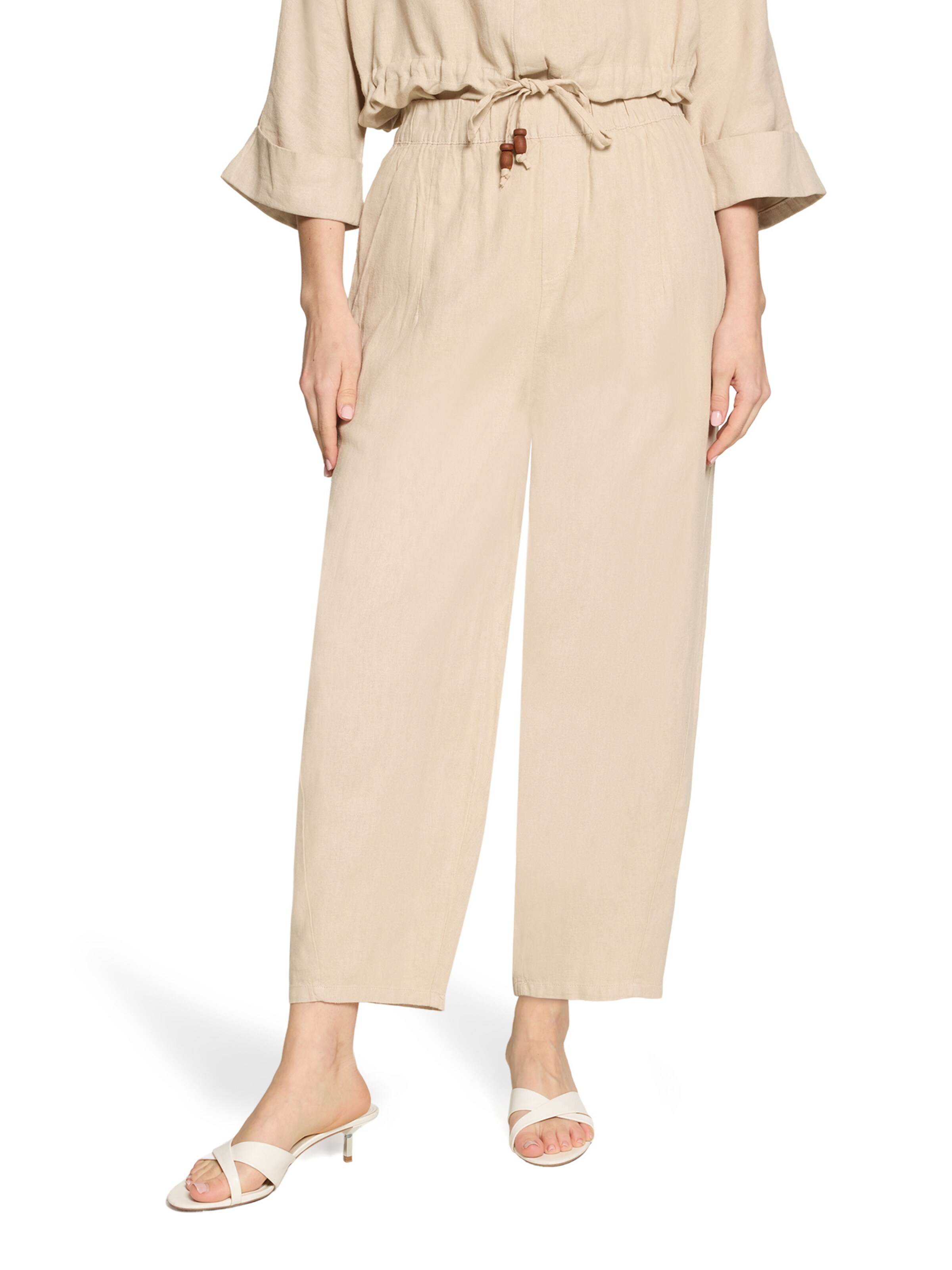 Cartoon Regular Trousers in Beige: front