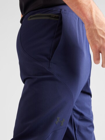 Tapered Pantaloni sport de la UNDER ARMOUR pe albastru