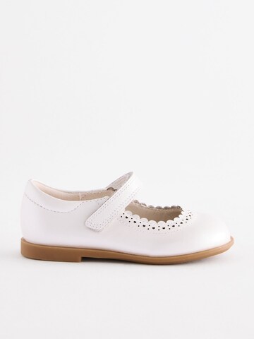 Next - Bailarina en blanco