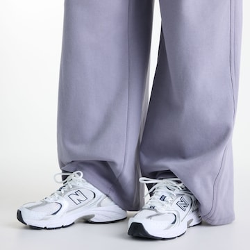 new balance Wide leg Broek 'Brushed Coastal Fleece Pant' in Grijs