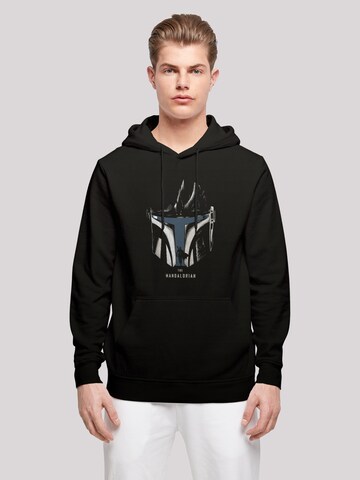 F4NT4STIC Sweatshirt 'Star Wars The Mandalorian Helmet Silhouette' in Zwart: voorkant