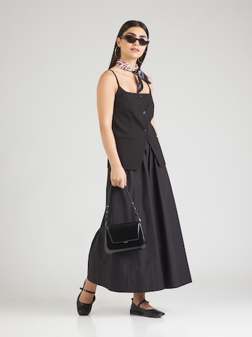 ONLY - Top 'ONLADORA' en negro