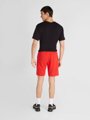 Champion Authentic Athletic Apparel Regular Broek in Rood