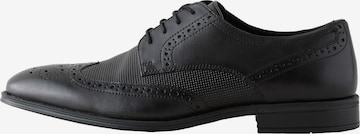 Chaussure à lacets Next en noir : devant
