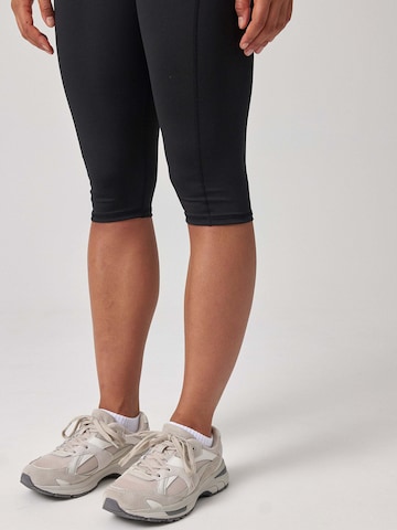 SNOCKS Skinny Sportbroek in Zwart