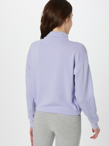 Champion Authentic Athletic Apparel Sweatshirt in Purple