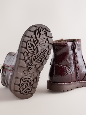 Bottes Next en rouge