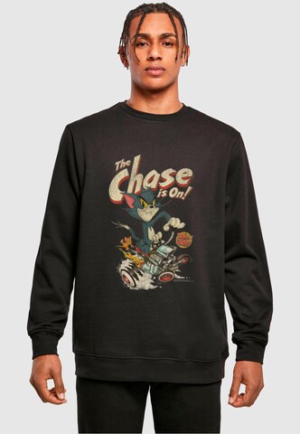 ABSOLUTE CULT Sweatshirt 'Tom And Jerry - The Chase Is On' in Black: front