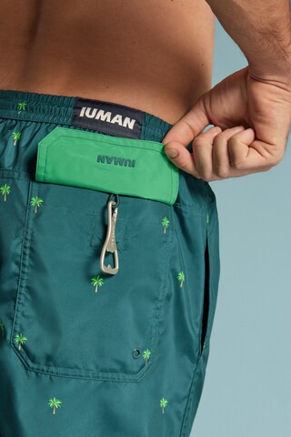 IUMAN Intimissimi Board Shorts in Green