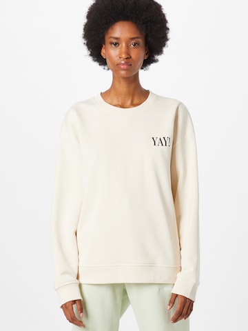 #NANDINI x NovaLanaLove Sweatshirt 'YAY' in Beige: predná strana