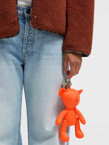 SENSES.THE LABEL Key Ring in Orange: front