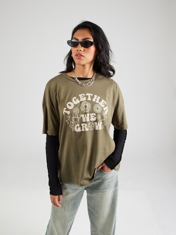 Noisy may T-Shirt in Grün: Vorderseite