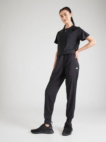 ADIDAS PERFORMANCE Tapered Sportbroek 'Own The Run' in Zwart