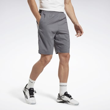 Reebok Regularen Športne hlače | siva barva: sprednja stran