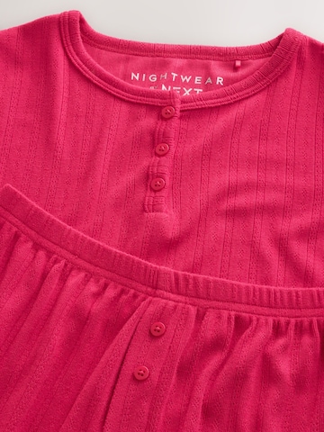 Pijamale de la Next pe roșu