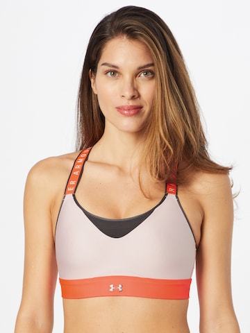 Bustier Soutien-gorge de sport 'Infinity' UNDER ARMOUR en rose : devant