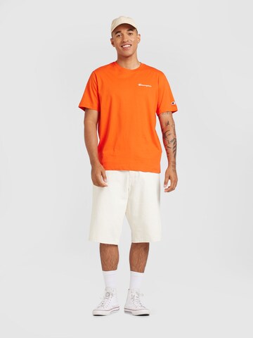 Maglietta di Champion Authentic Athletic Apparel in arancione