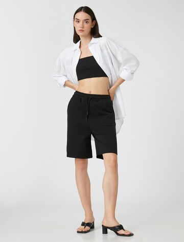 Koton Loosefit Short in Schwarz