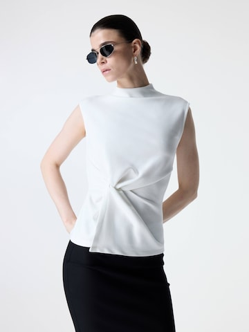 Haut adl en beige