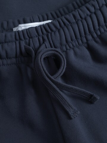 NIKIN Tapered Trousers 'Tree' in Blue