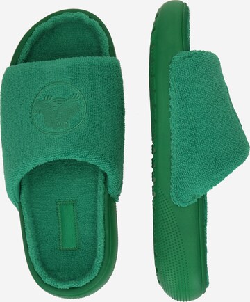 Crocs Pantolette i grön