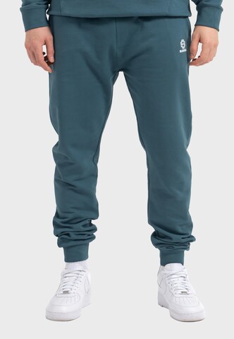 Oldskull Tapered Pants 'Basic Oldskull 25 Logo' in Blue: front