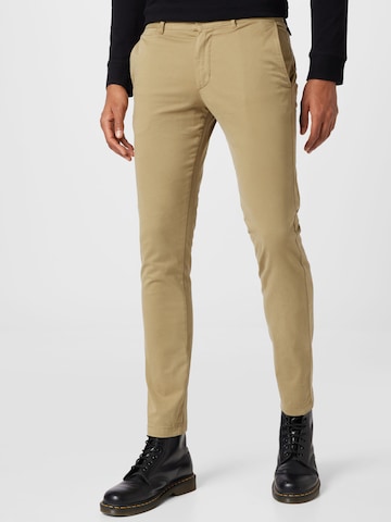 TOMMY HILFIGER Slimfit Chinohousut värissä beige: edessä