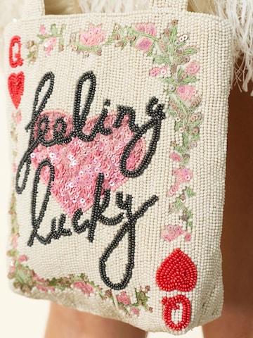 Next Ostoskassi värissä valkoinen