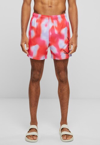 Pantaloncini da surf di Karl Kani in rosa: frontale