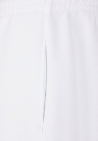 Tapered Pantaloni di Urban Classics in bianco