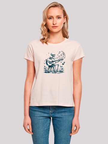 T-shirt 'Skelett spielt Gitarre, Musik, Liebe' F4NT4STIC en rose : devant