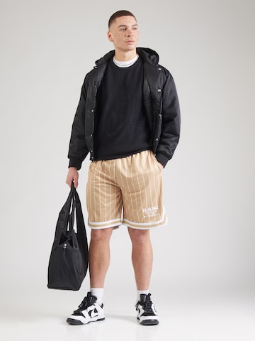 Karl Kani Loose fit Trousers in Beige