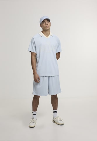 Maglietta 'Heritage' di Karl Kani in blu