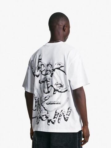 T-Shirt 'GOODS' Bershka en blanc
