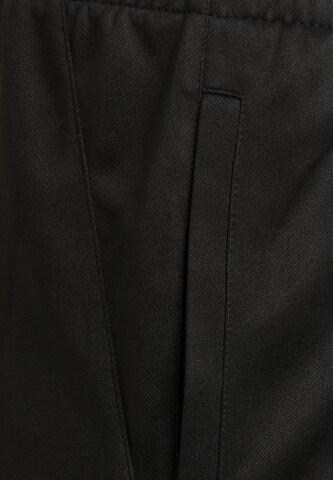 Hummel Regular Sports trousers in Black