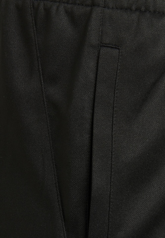 Hummel Normalny krój Spodnie sportowe w kolorze czarny