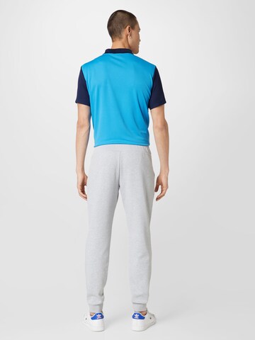 Effilé Pantalon de sport Lacoste Sport en gris