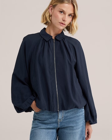 Bluză de la WE Fashion pe albastru: față