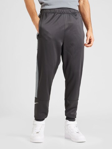 Effilé Pantalon 'AIR' Nike Sportswear en gris : devant