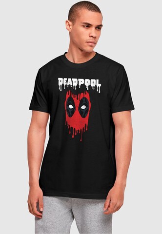 ABSOLUTE CULT T-Shirt 'Deadpool - Dripping Head' in Schwarz: Vorderseite