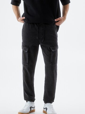 Tapered Jeans cargo di Pull&Bear in nero: frontale