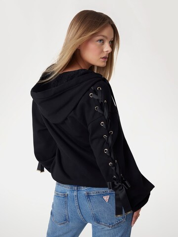 GUESS Sweatjacke in Schwarz