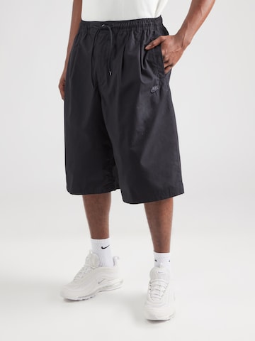 Nike Sportswear Свободный крой Брюки со складками 'CLUB SEOUL' в Черный: спереди
