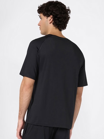 T-Shirt fonctionnel Champion Authentic Athletic Apparel en noir