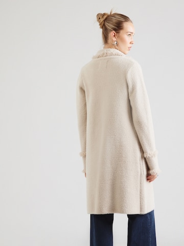 RINO & PELLE Stickad kappa 'Catena' i beige