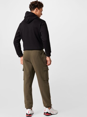 Tapered Pantaloni cargo 'Power' di PUMA in verde