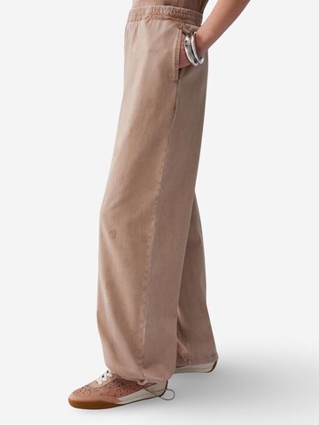 Loosefit Pantaloni sportivi 'ECS JERSEY LUNGO TA6102 JS008' di Liu Jo in beige