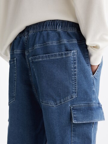 Effilé Jeans cargo Pull&Bear en bleu