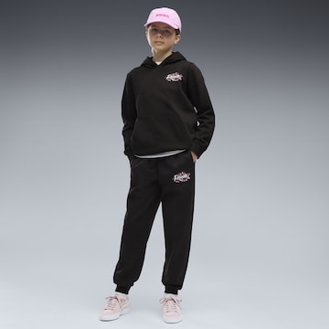 PUMA Tapered Sportbroek 'Essentials Nature 2.0' in Zwart